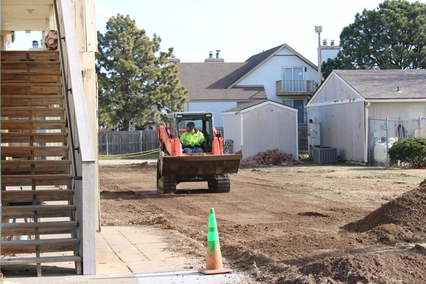 Grading behind an apartment building