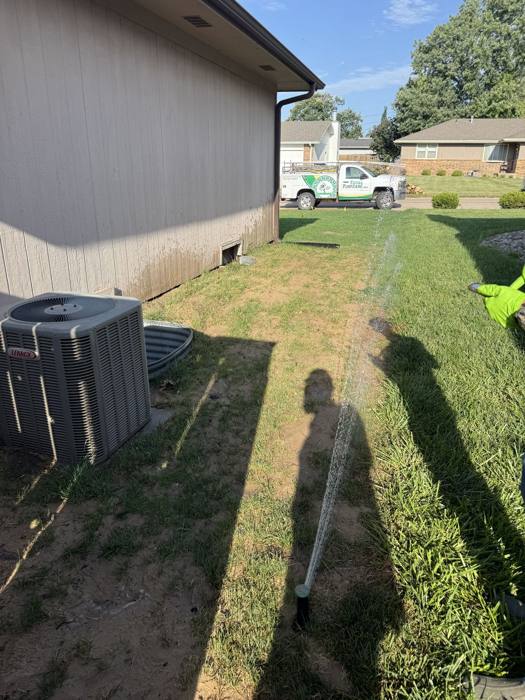 New line trenched along a house