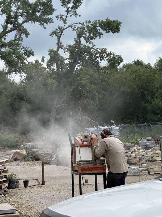 Cutting limestone at the shop